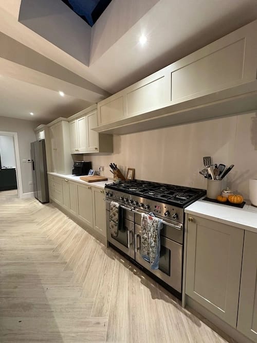 WhatsApp Image 2024-12-03 at 12.33.26 Custom kitchen refurbishment in Surrey with an elegant island and premium finishes.